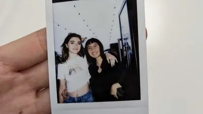 Polaroid image of two women smiling