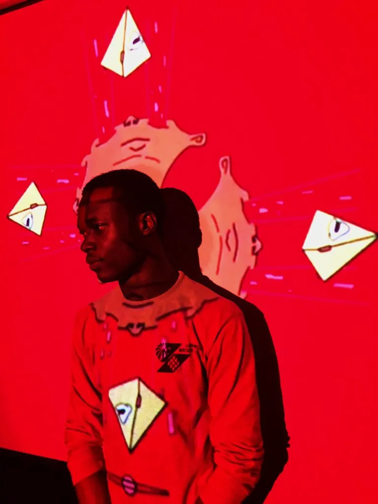 Portrait against a red wall