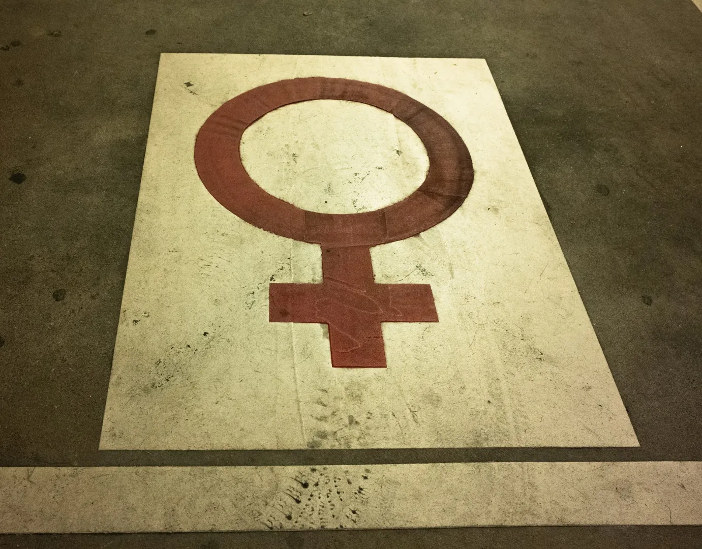 Female symbol on the ground