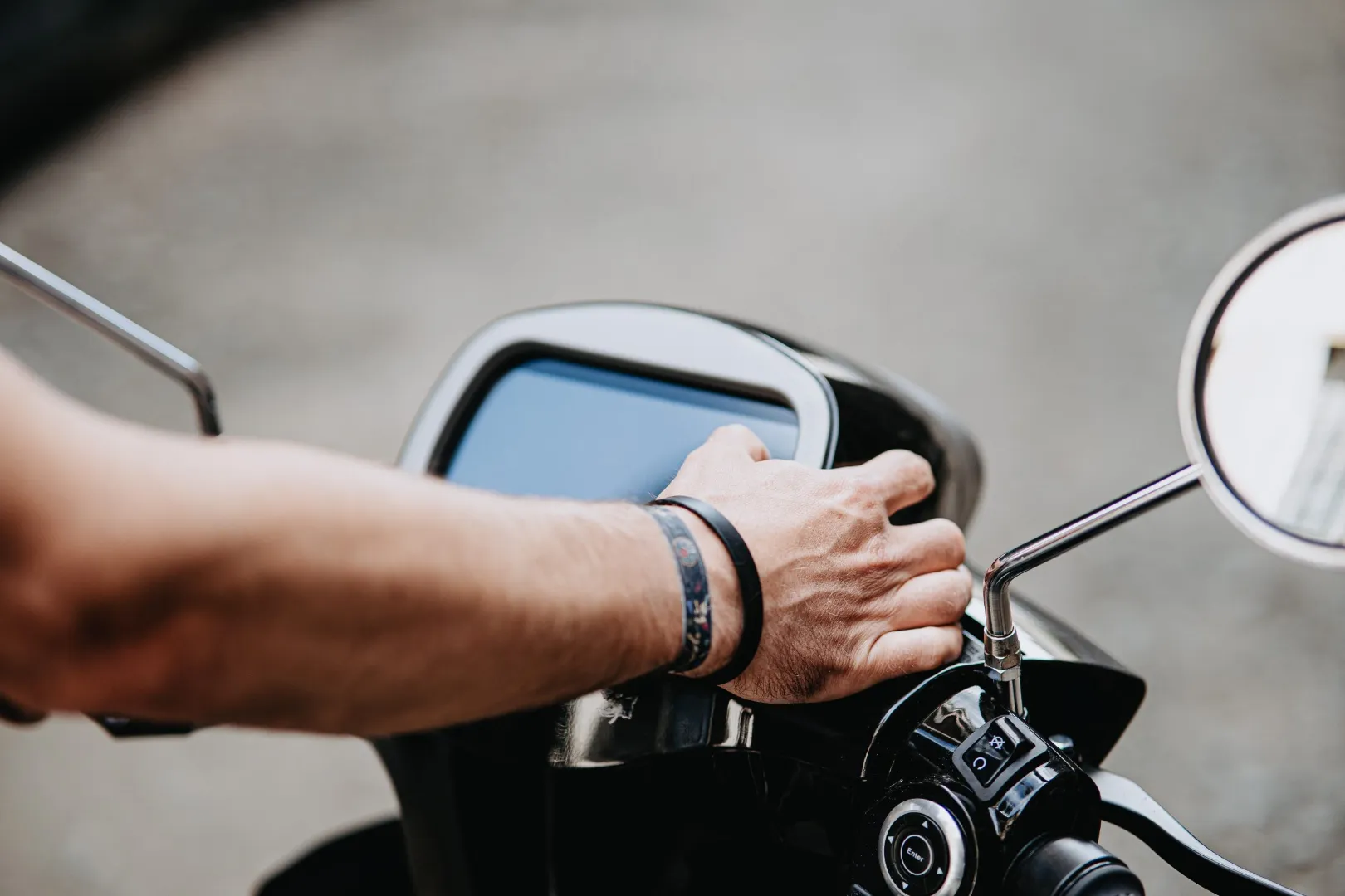 Man looking at motorbike display