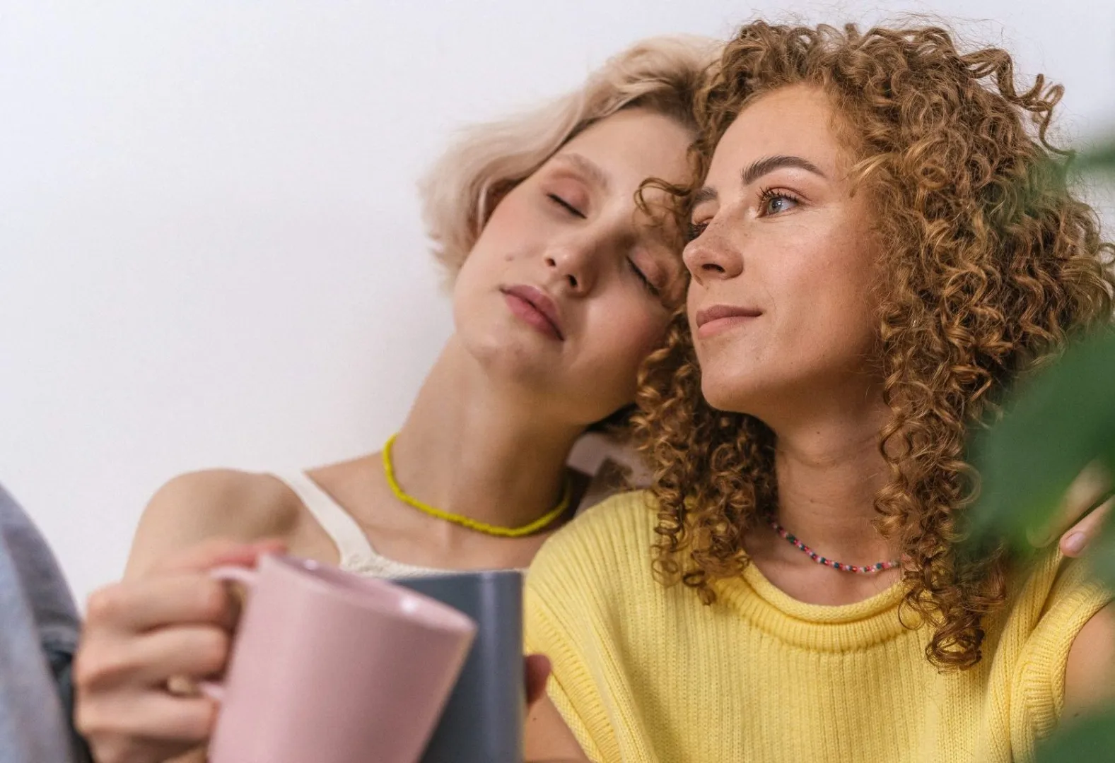 Two women relaxing with mugs of tea, from The Un-dependents in profile feature