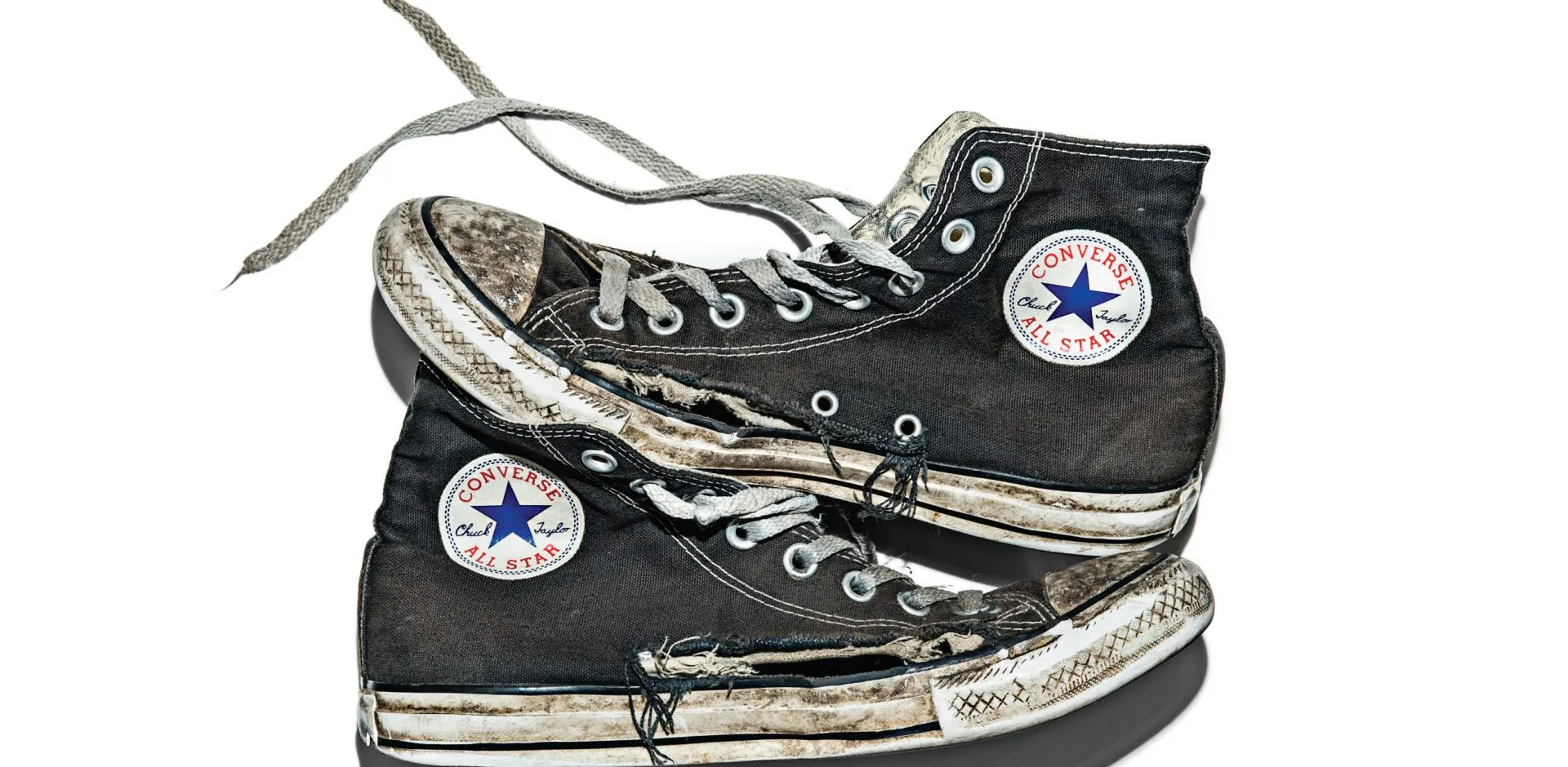 Worn black Converse All Star high-tops from Crowd DNA's Foot Locker shopper journey research